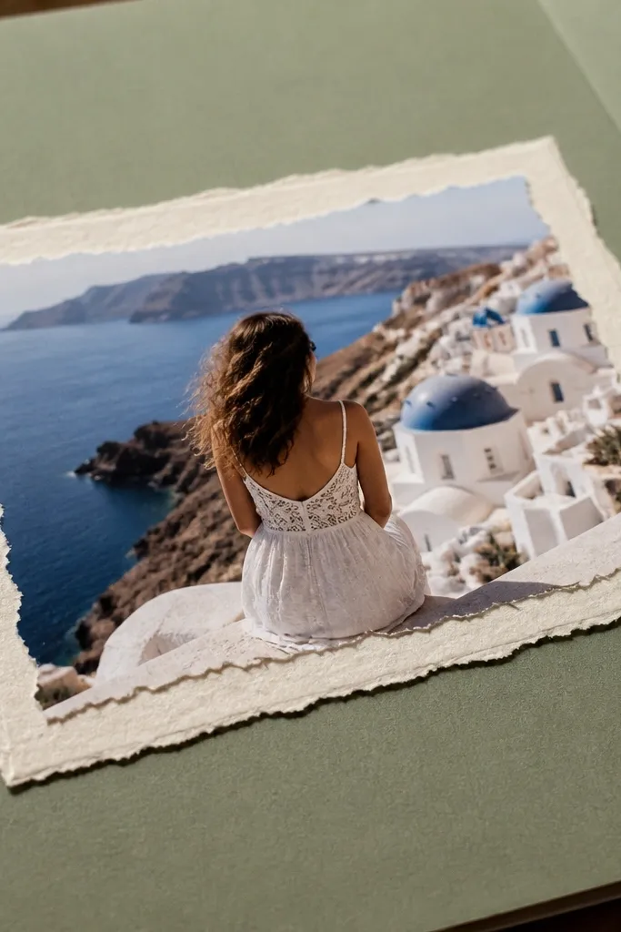 A scrapbook page with a torn-paper window showing a underneath