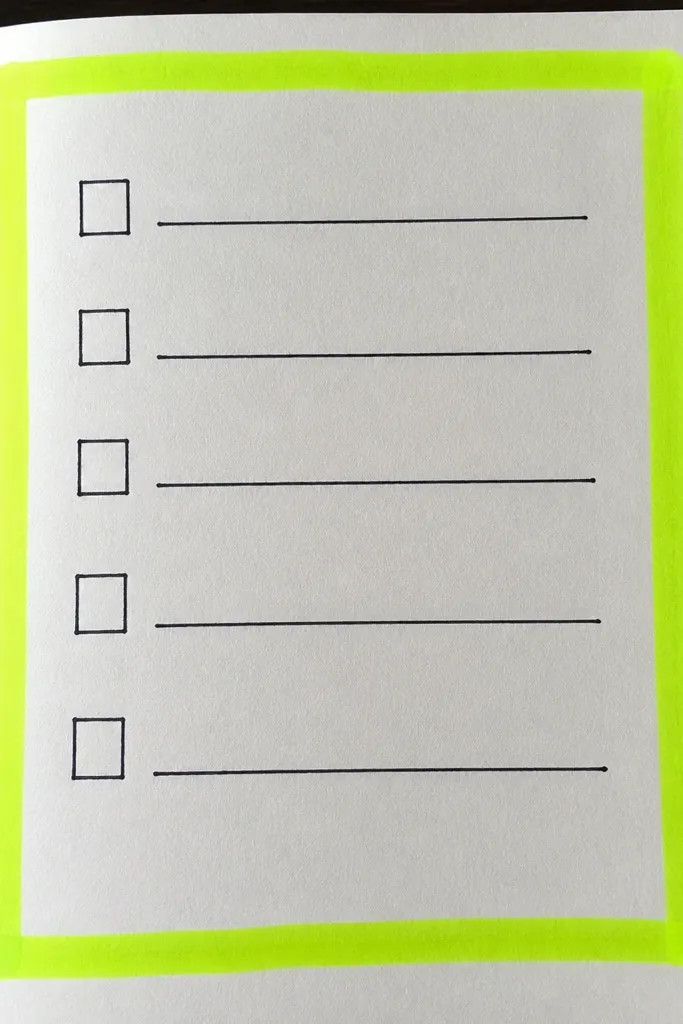 Black checklist framed by neon highlighter lines
