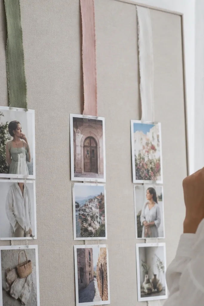 Vision board with fabric scraps forming vertical ribbon lines and layered magazine photos