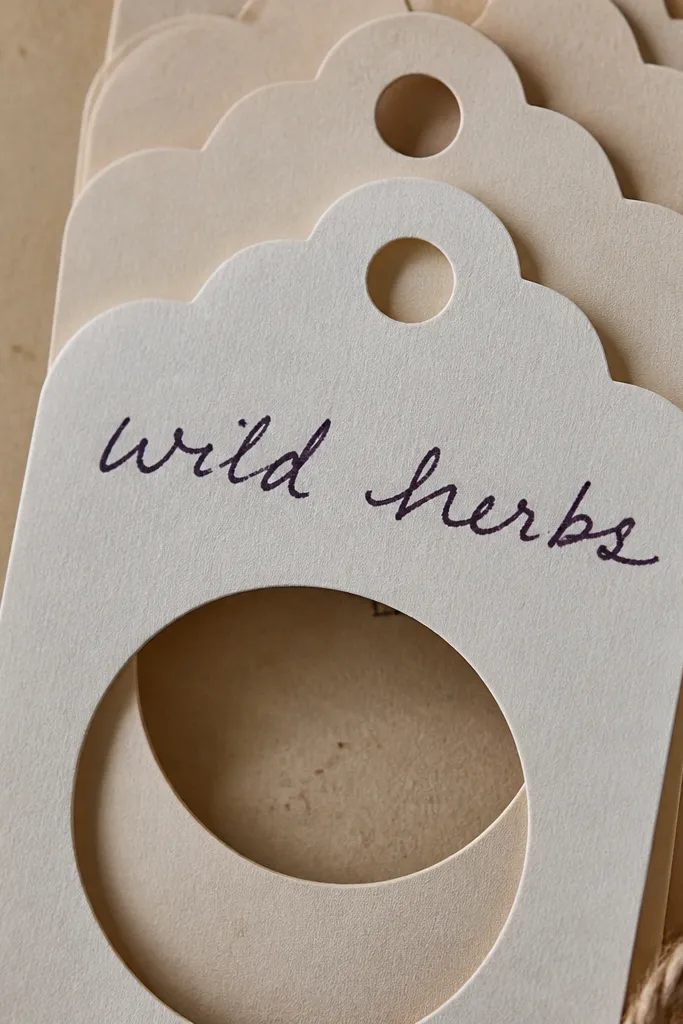 Handmade die-cut style label shapes made with a hole punch