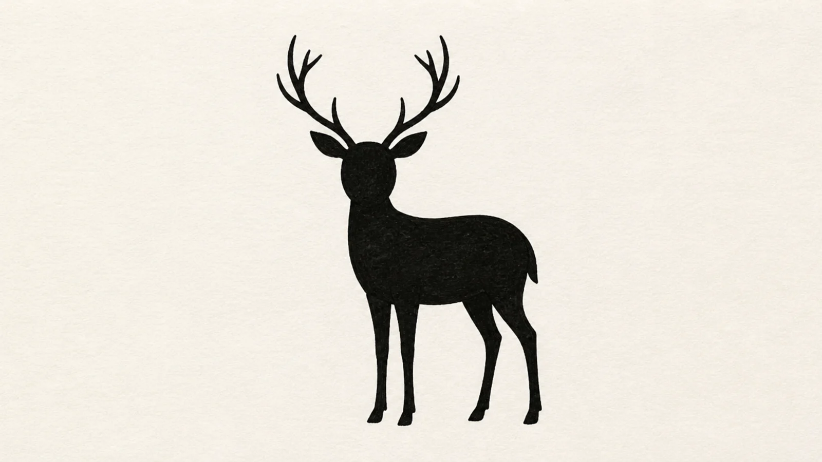 A solid black silhouette of a standing deer with antlers
