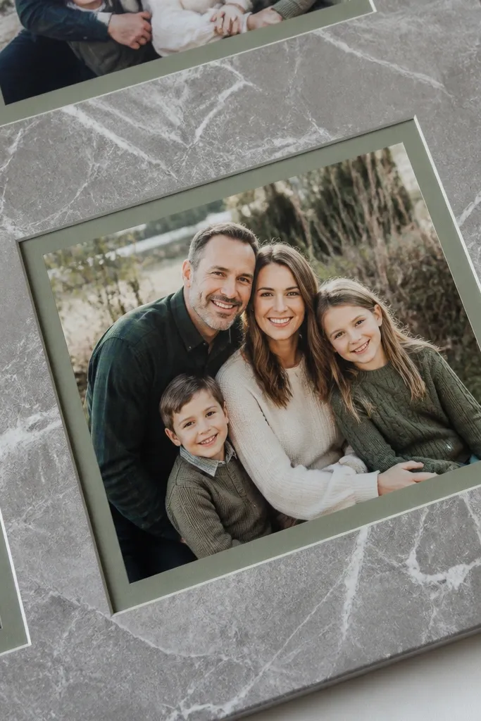 Marble-pattern contact paper frames around photos on white background with sage accents