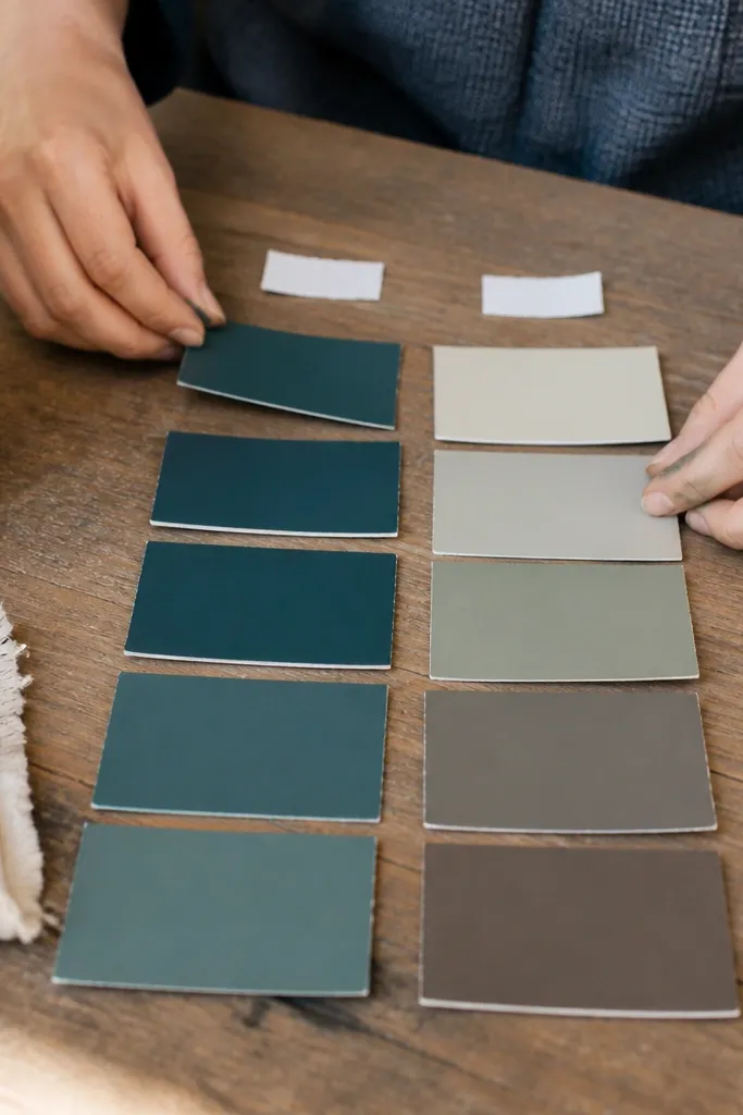 Board with paint chips arranged in a gradient and small before/next labels.