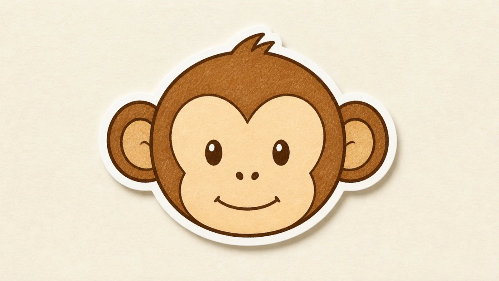 A simple monkey face with a thick white border like a sticker