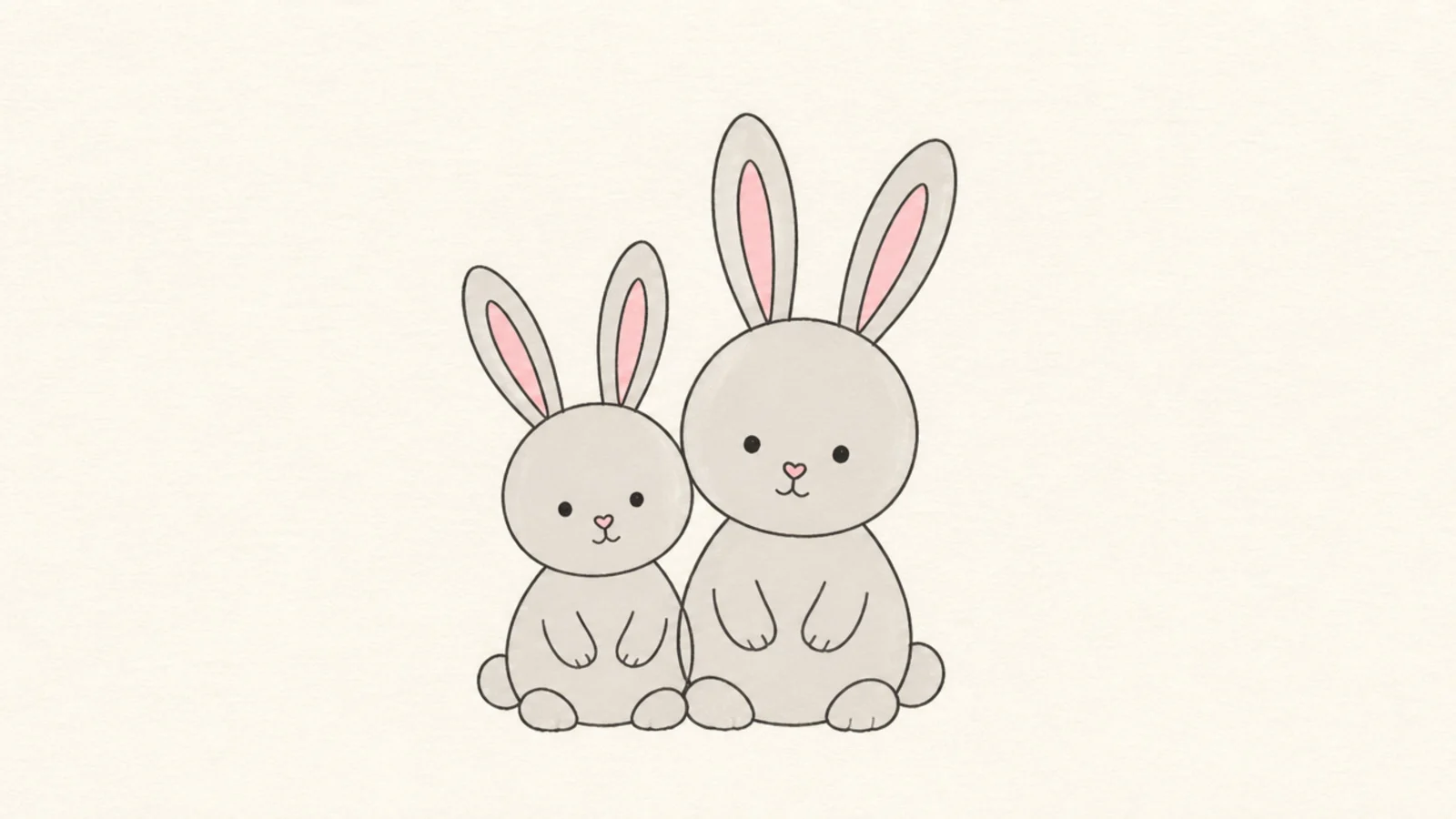 Two simple rabbits sitting side by side