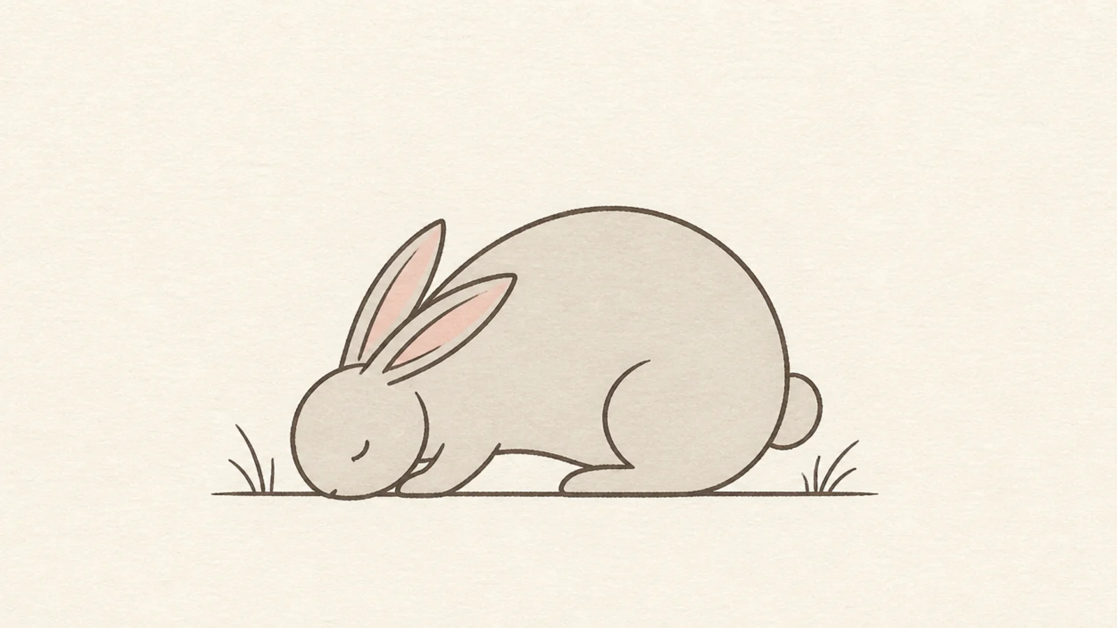 A simple rabbit with its head lowered to the ground
