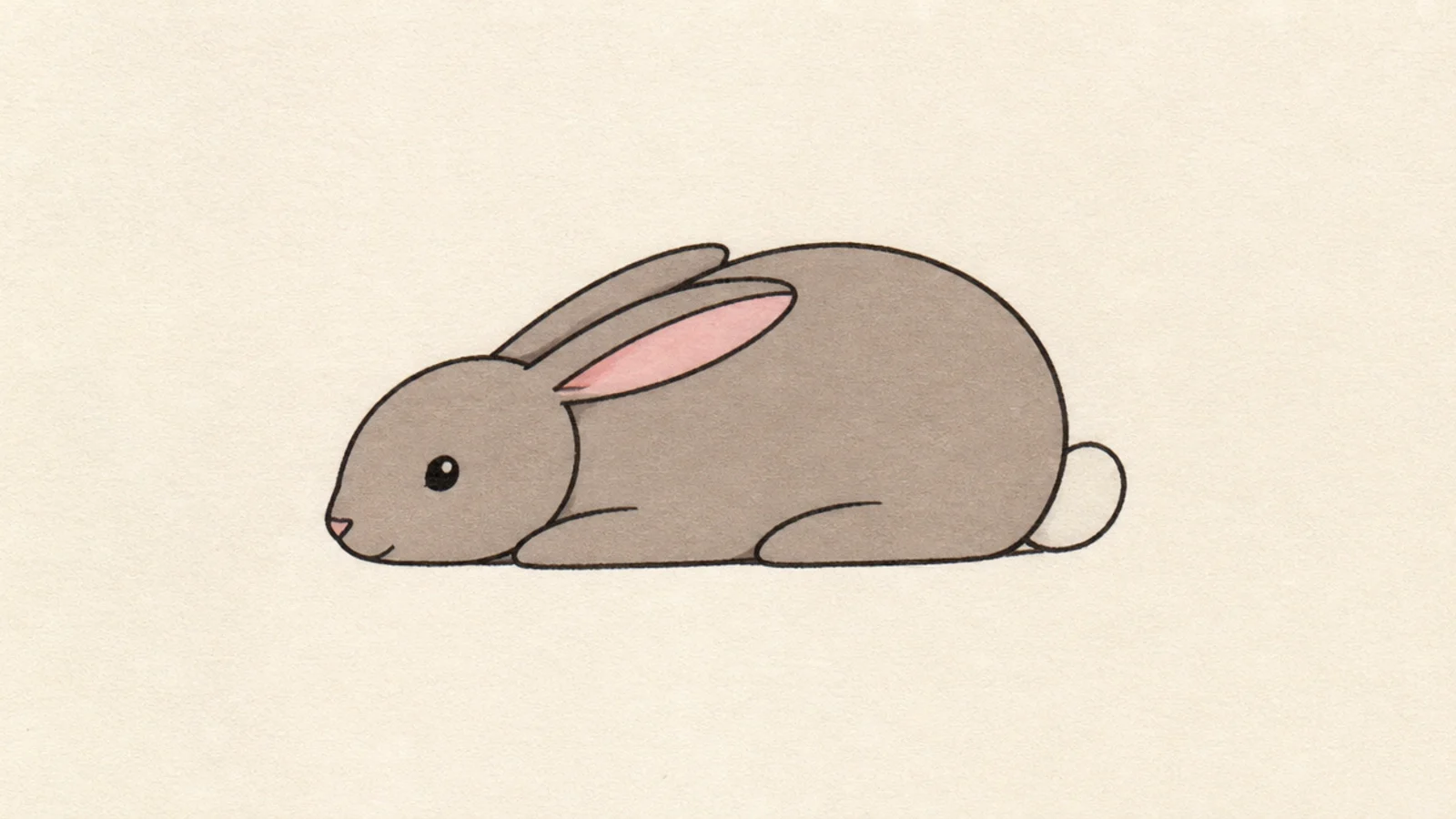 A simple rabbit crouched low to the ground