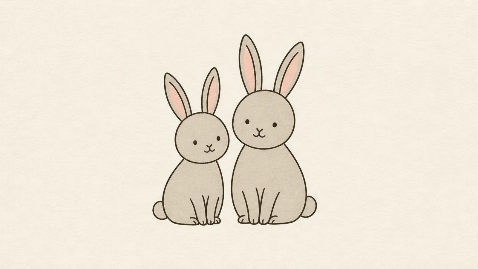 Two simple rabbits sitting side by side