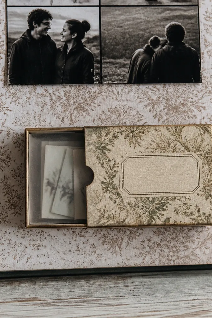 Matchbox-style pocket on a scrapbook page holding small notes
