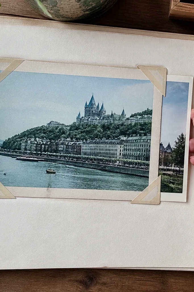 Postcard frame around a with tape hinges in corners