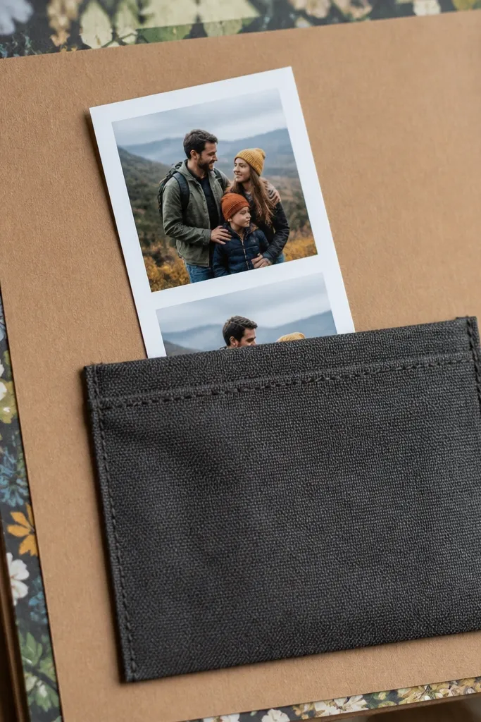 Fabric pocket holding a narrow strip across the page