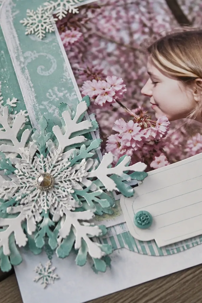 Paper snowflake layers in pastel colors around a